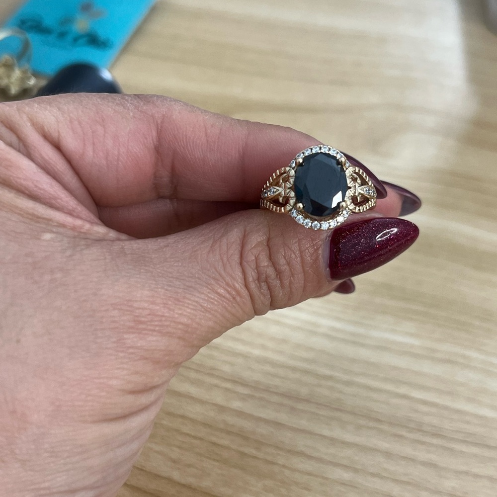 Elegant Black and Gold Ring